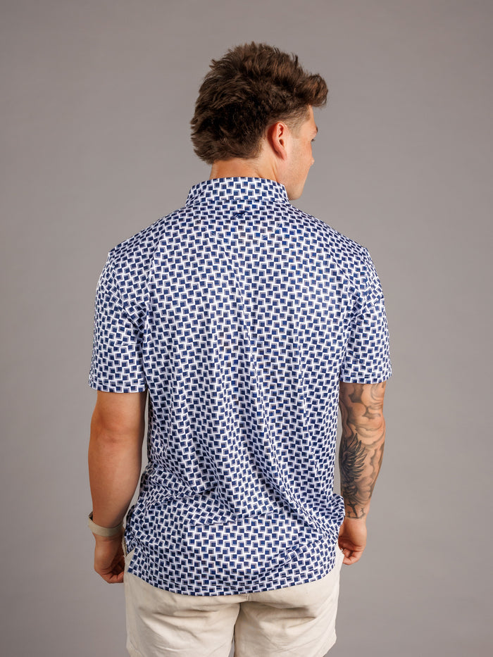 Men's checkered polo shirt by Arena Graffiti featuring Augusta University "A" logo, in a classic "A" checkered pattern.
