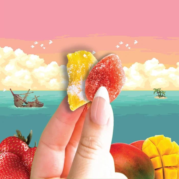 A piece of sour dried strawberry and a piece of sour dried mango