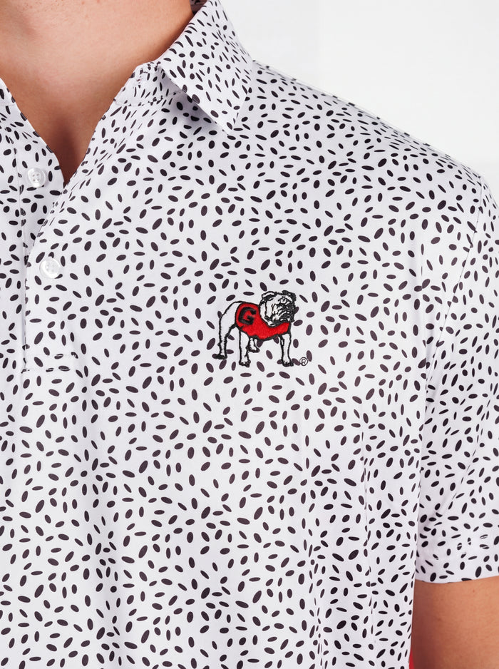 UGA Bulldogs men's black and white "Splatter Dawg" polo shirt by Arena Graffiti, featuring a bold splatter design and team logo.