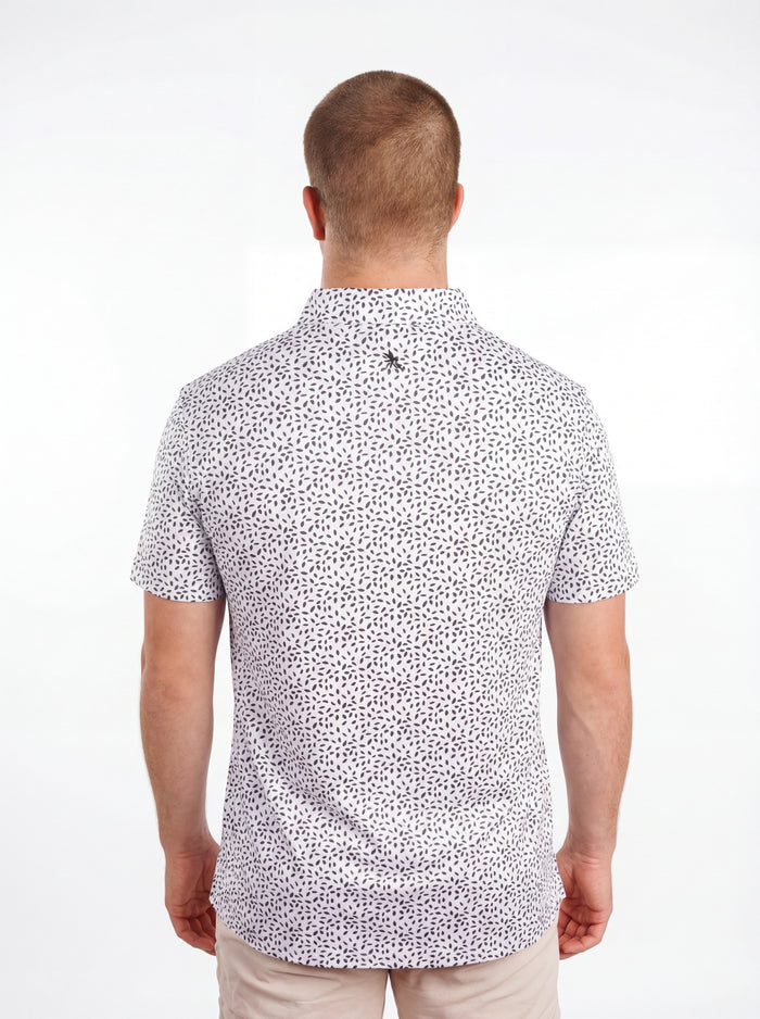 UGA Bulldogs men's black and white "Splatter Dawg" polo shirt by Arena Graffiti, featuring a bold splatter design and team logo.