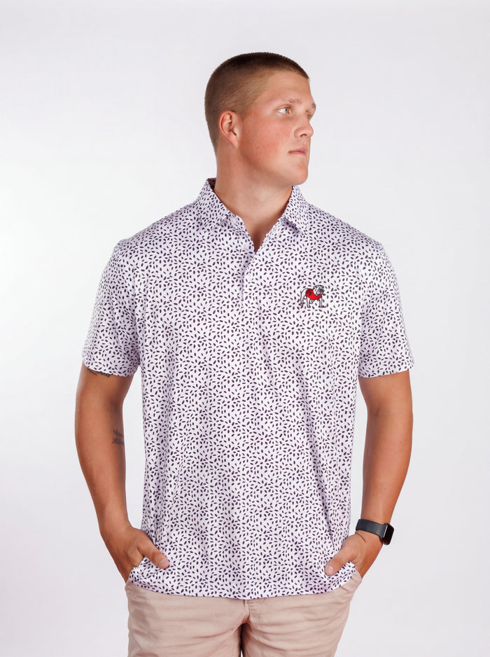 UGA Bulldogs men's black and white "Splatter Dawg" polo shirt by Arena Graffiti, featuring a stylish splatter design and team logo.