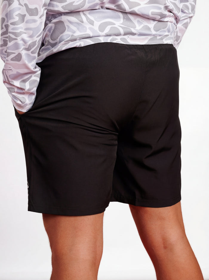Black UGA Bulldogs men's shorts with "Oval G" logo, featuring arena graffiti design and athletic fit.