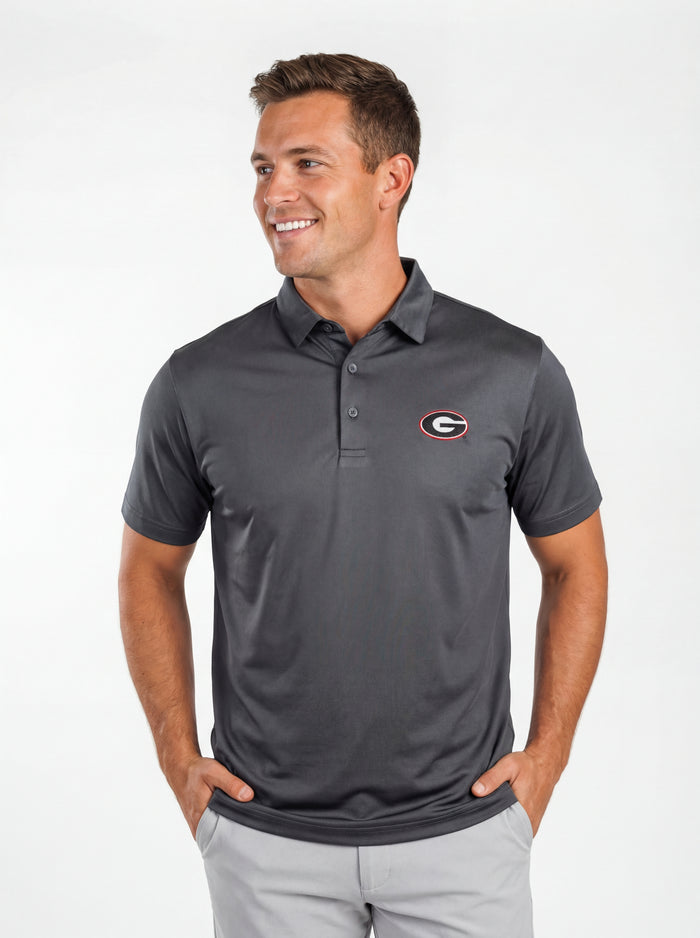 UGA Bulldogs men's grey "Mark" polo shirt by Arena Graffiti, showing front view with collar and logo detail.