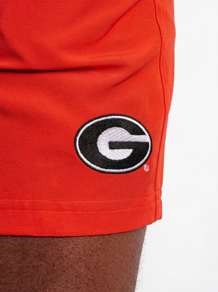 UGA Bulldogs men's "True Dawg" shorts by Arena Graffiti featuring team logo and athletic fit, in navy and red fabric.