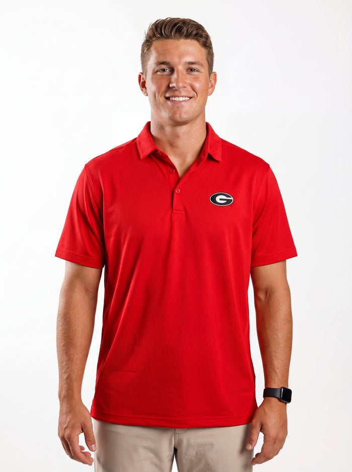 UGA Bulldogs men's red "Hedges" polo shirt by Arena Graffiti, featuring the team logo and classic collar design.